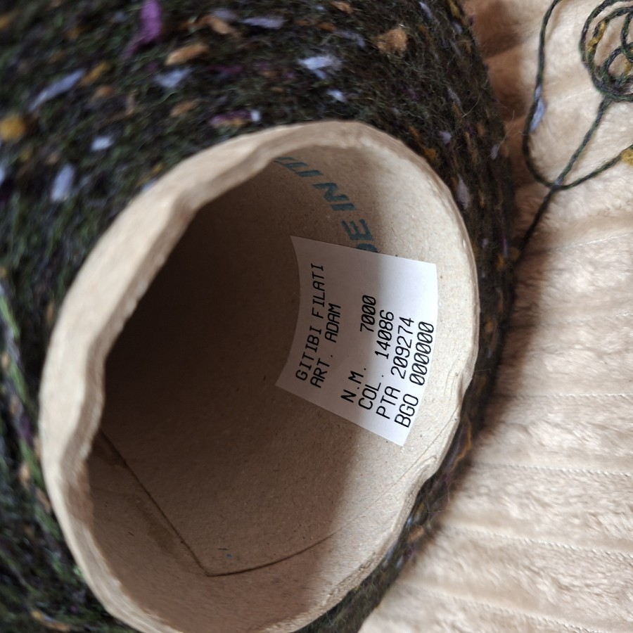 Pusvilnės siūlai – tamsiai žalios spalvos tvidas (100 g)